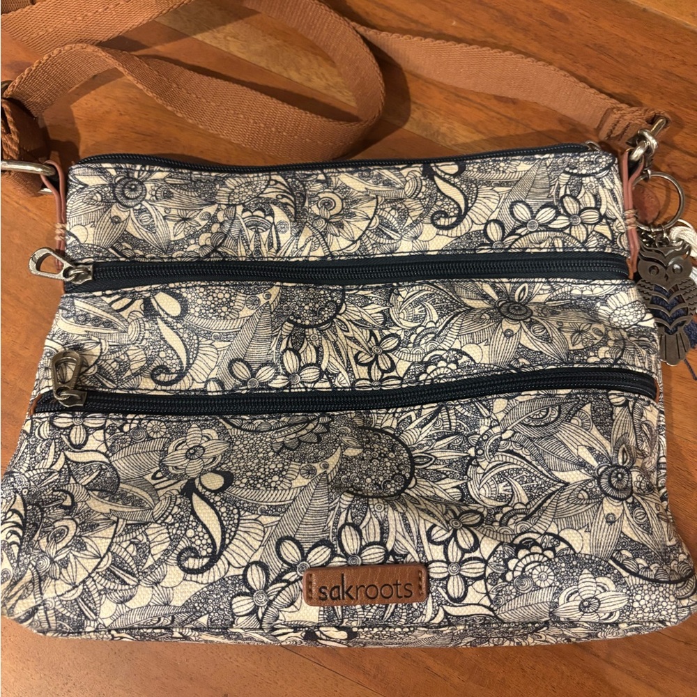 Sakroots Navy and Cream Floral Crossbody Bag